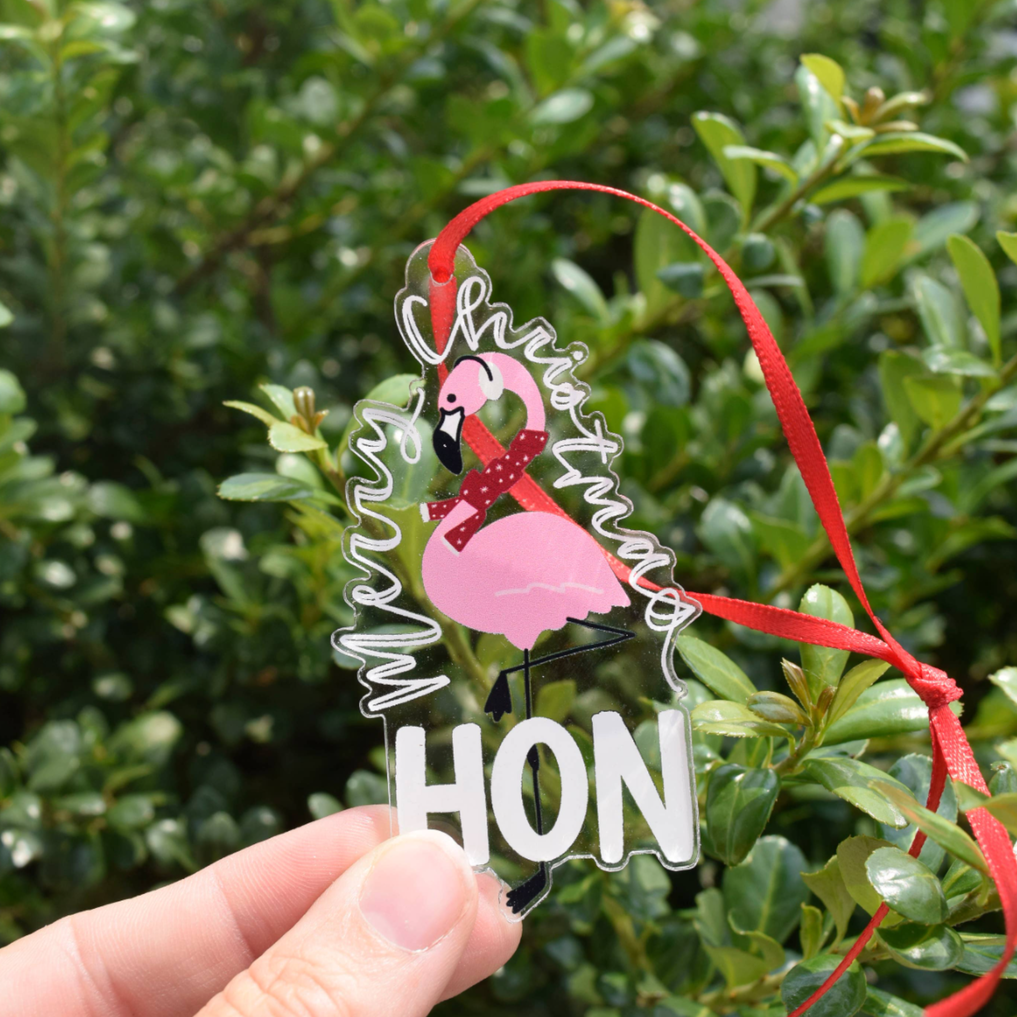 the letters mdn – Merry Christmas Hon Flamingo Acrylic Ornament